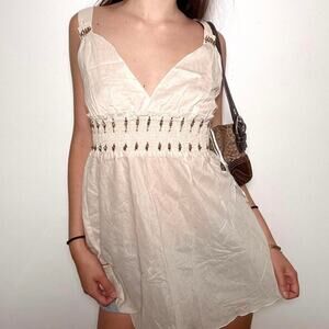 Gorgeous cream zinger flowy tank with beaded details